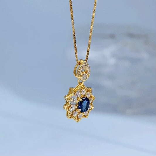 Blue Sapphire Sunburst Gold Vermeil Pendant gold-tone supplier photograph 8565