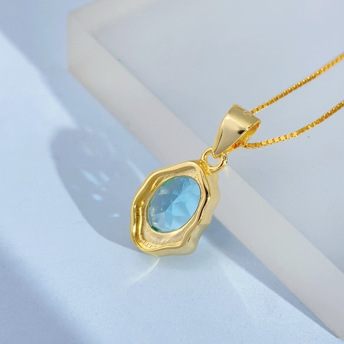 Handmade Sky Blue Topaz Oval Gold Vermeil Pendant - supplier photo angle 8616