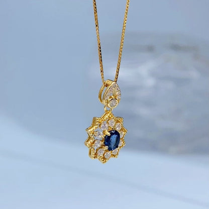 Blue Sapphire Sunburst Gold Vermeil Pendant gold-tone supplier photograph 8565