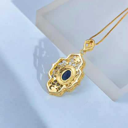 Blue Sapphire Ornate Floral Gold Vermeil Pendant gold-tone supplier photograph 8606